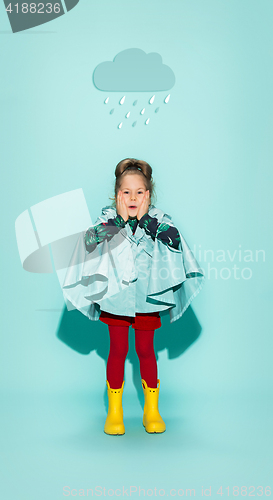 Image of Little girl posing in fashion style wearing autumn clothing.