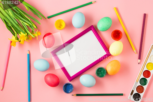 Image of The top view of easter on pink table office workplace