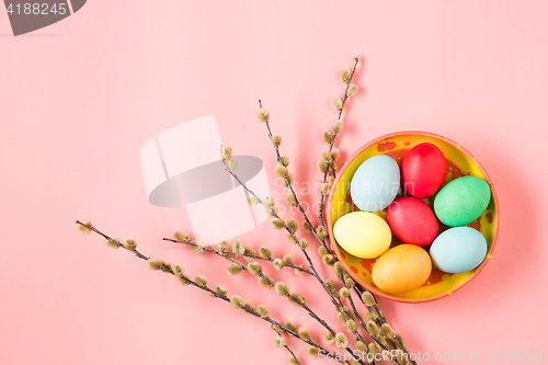 Image of The top view of easter on pink table office workplace