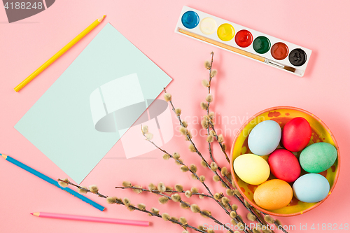 Image of The top view of easter on pink table office workplace