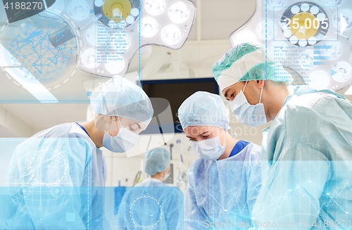 Image of group of surgeons in operating room at hospital