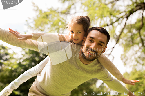 Image of happy family having fun in summer park