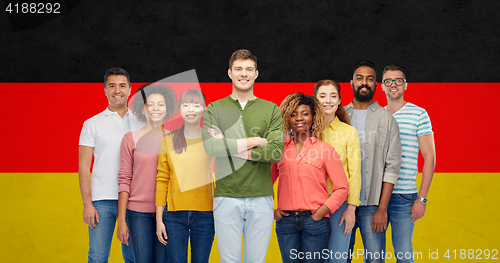 Image of international group of people over german flag