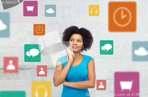 Image of happy afro american young woman with menu icons