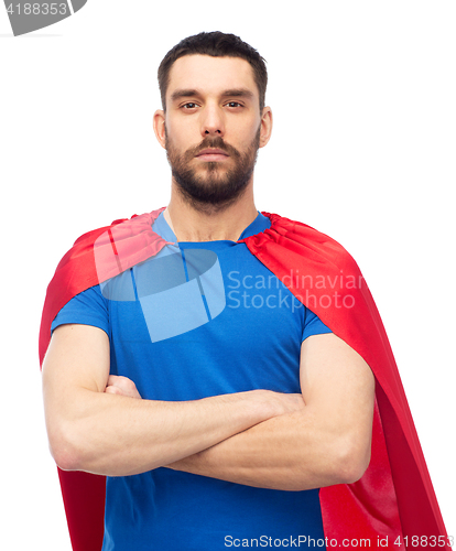 Image of man in red superhero cape