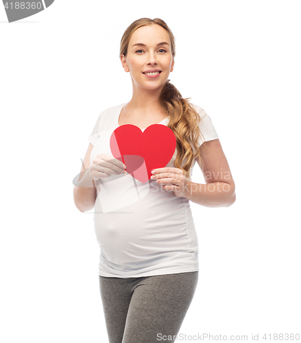 Image of happy pregnant woman with red heart