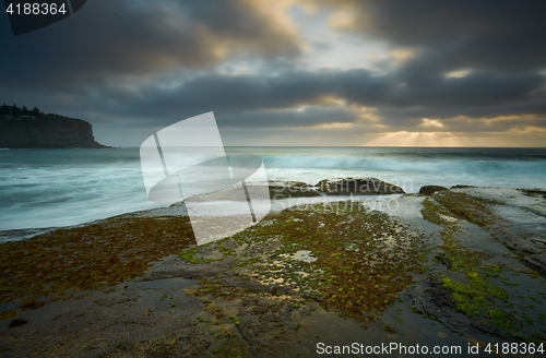 Image of Moody day over Bilgola rockshelf Australia