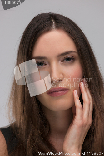 Image of portrait  of beautiful young brunette woman