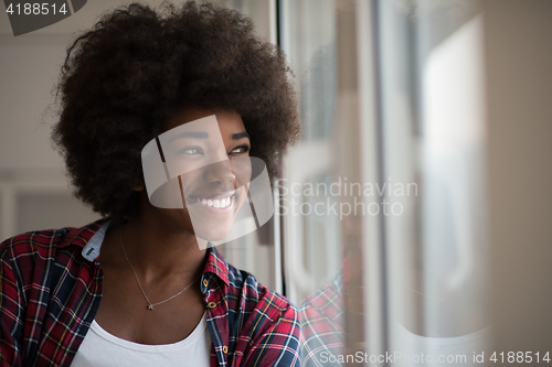 Image of portrait of a young beautiful black woman