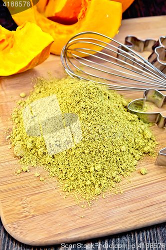 Image of Flour pumpkin with mixer and vegetable on board