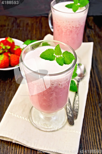 Image of Soup strawberry in goblet on board