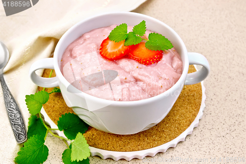 Image of Soup strawberry in bowl on stone table