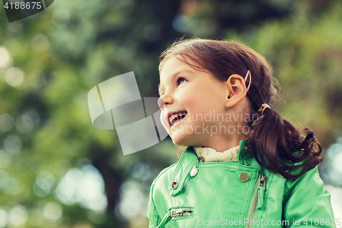 Image of happy beautiful little girl portrait outdoors