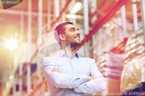 Image of happy man at warehouse