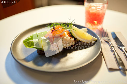 Image of close up of toast skagen with caviar and bread