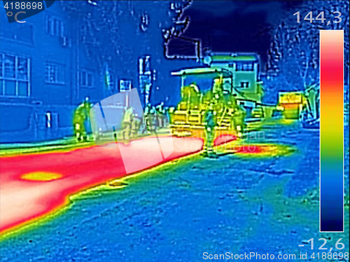 Image of Infrared thermovision image Workers on Asphalting Road street