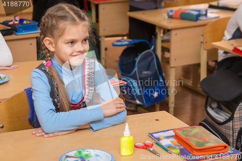 Image of Happy first grader at a lesson in the school of technology