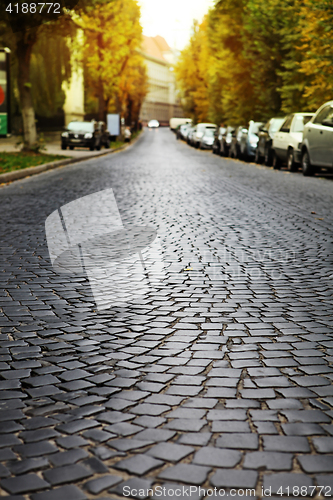 Image of empty cobblestone road