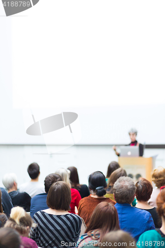 Image of Woman giving presentation on business conference.