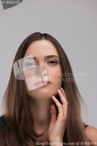 Image of portrait  of beautiful young brunette woman