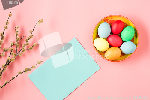 Image of The top view of easter on pink table office workplace