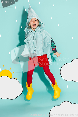 Image of Little girl posing in fashion style wearing autumn clothing.