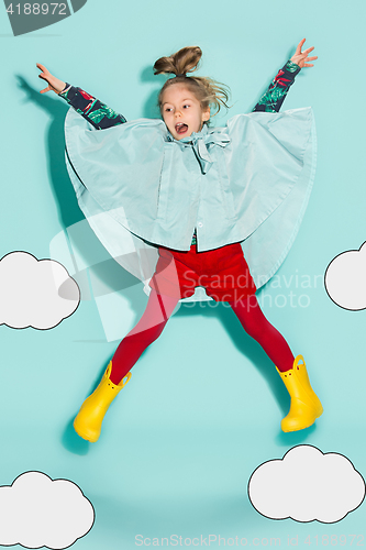 Image of Little girl posing in fashion style wearing autumn clothing.