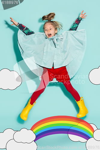 Image of Little girl posing in fashion style wearing autumn clothing.