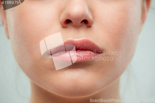 Image of The close up shot of woman lips