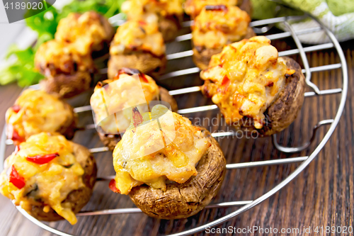 Image of Champignons stuffed meat on lattice with parsley