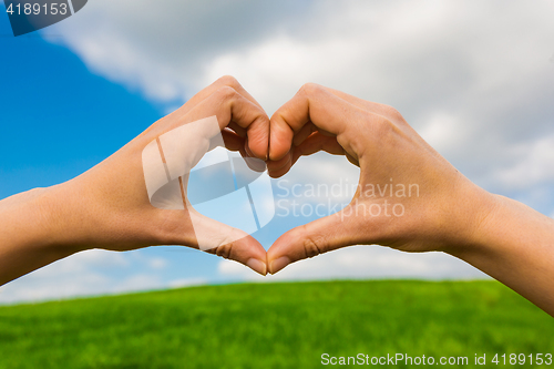 Image of Hands making a heart shape