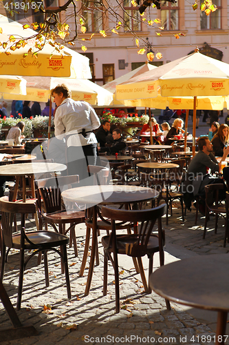 Image of cafeteria on the street at sun day