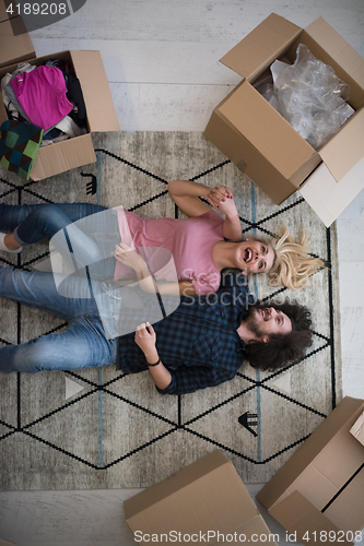 Image of Top view of attractive young couple