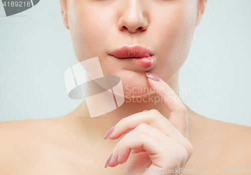 Image of The close up shot of woman lips