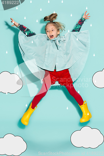 Image of Little girl posing in fashion style wearing autumn clothing.