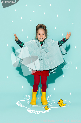 Image of Little girl posing in fashion style wearing autumn clothing.