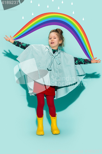 Image of Little girl posing in fashion style wearing autumn clothing.