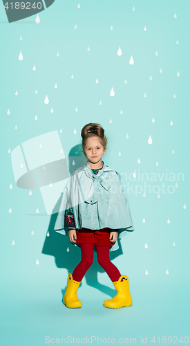 Image of Little girl posing in fashion style wearing autumn clothing.