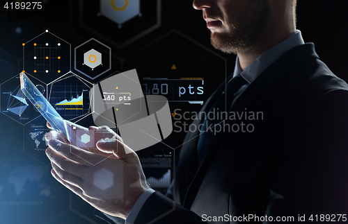 Image of close up of businessman with transparent tablet pc