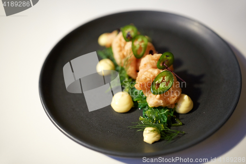 Image of close up of prawn salad with jalapeno and wakame