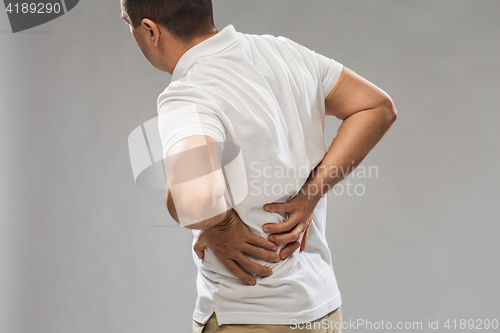 Image of close up of man suffering from backache