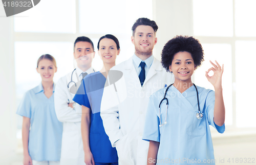 Image of group of happy doctors at hospital