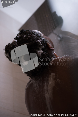 Image of African American woman in the shower