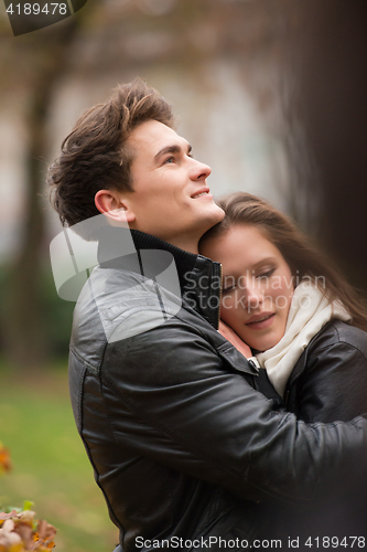 Image of Autumn portrait of attractive happy couple