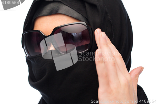 Image of close up of muslim woman in hijab and sunglasses 