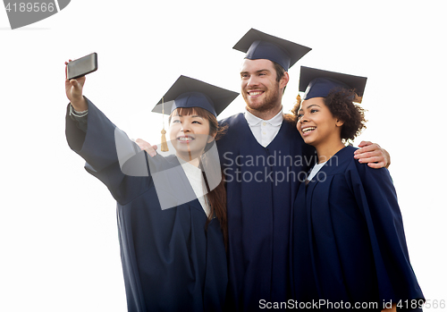 Image of students or bachelors taking selfie by smartphone