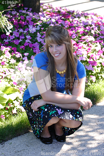 Image of Pretty Teenage Girl crouched down