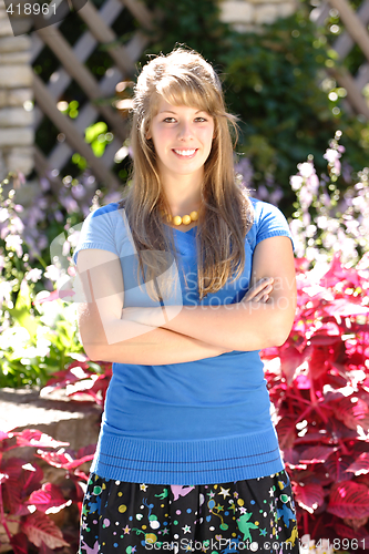 Image of Teenage Girl Standing with arms Crossed