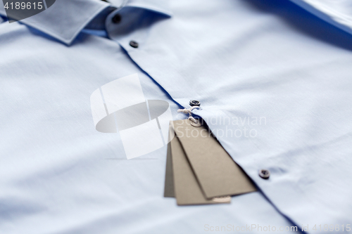 Image of close up of shirt with price tag