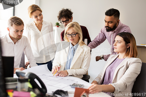 Image of business team discussing house project at office